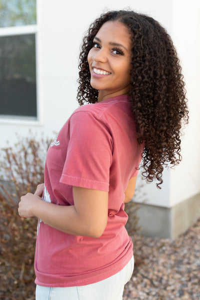 Side view of the rodeo cowgirl graphic tee