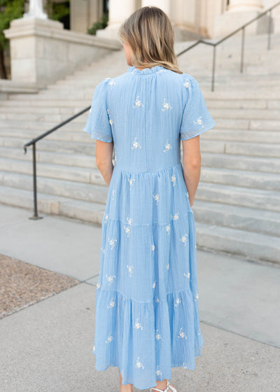 Back view of the blue floral dress at Lena Layne