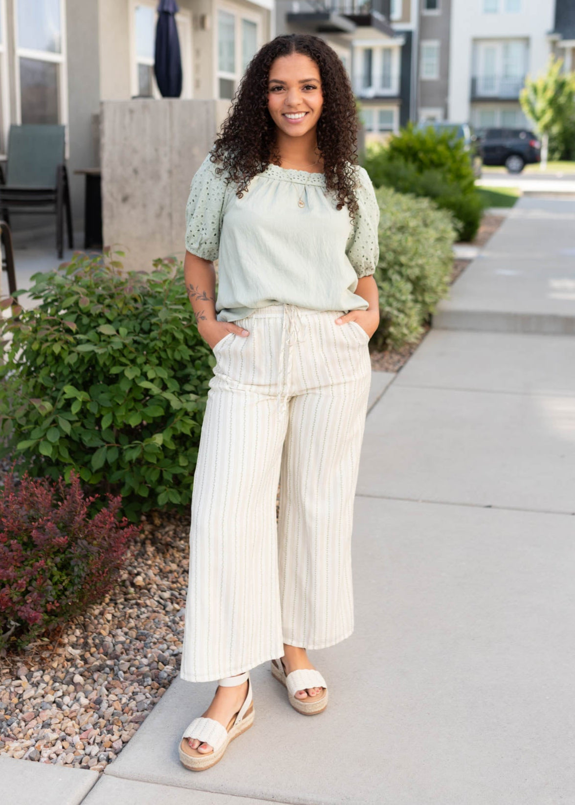 Short sleeve sage top with eyelet sleeves