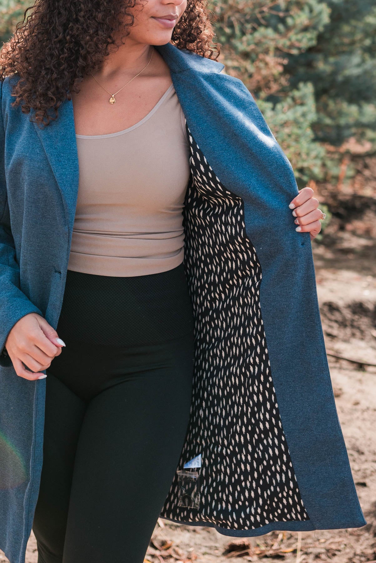 The inside lining of the indigo coat