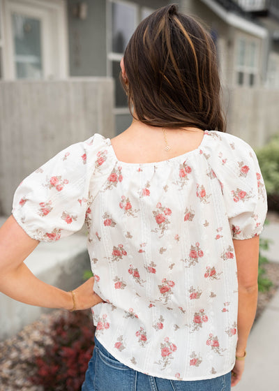Back view of the ivory floral top
