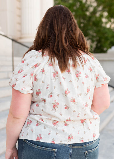 Back view of the plus size ivory floral top