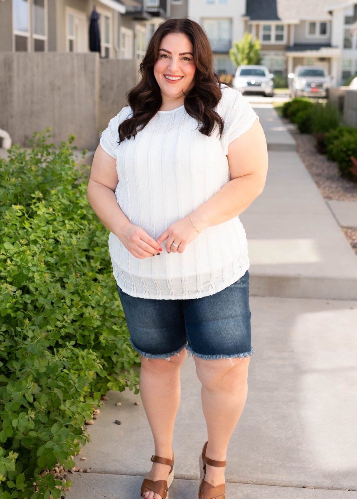 Plus size white textured top with short sleeves