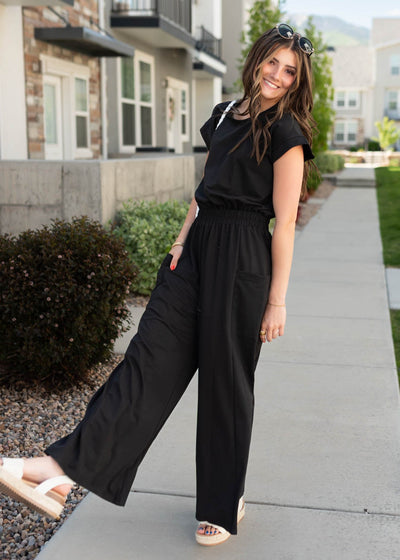 Side view of the black jumpsuit