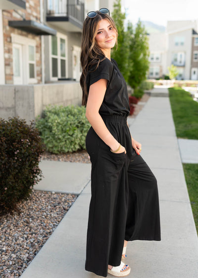 Side view of the black jumpsuit