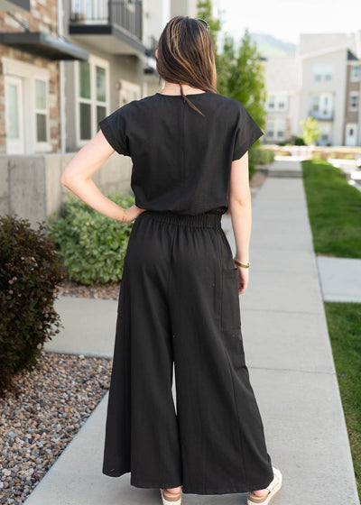 Back view of the black jumpsuit