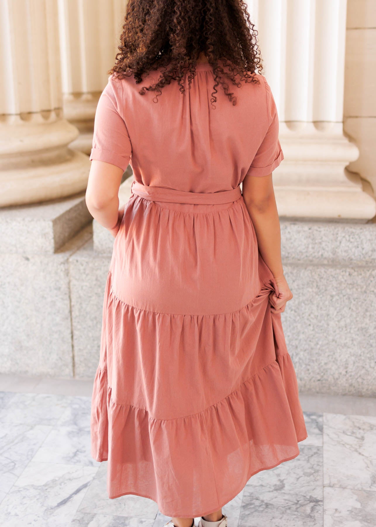 Back view of the dark blush bow tie dress