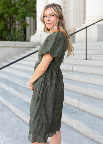 Side view of the olive embroidered square neck dress by Lena Lou
