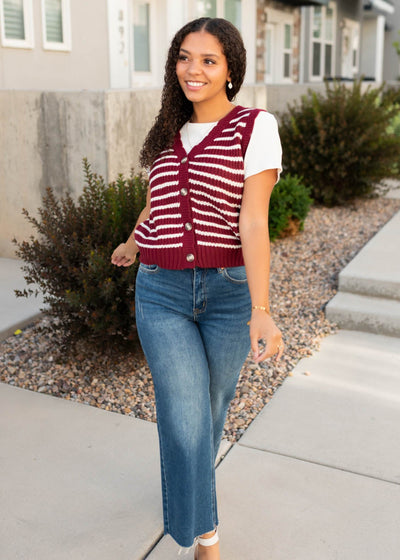 Burgundy striped sweater vest that buttons up