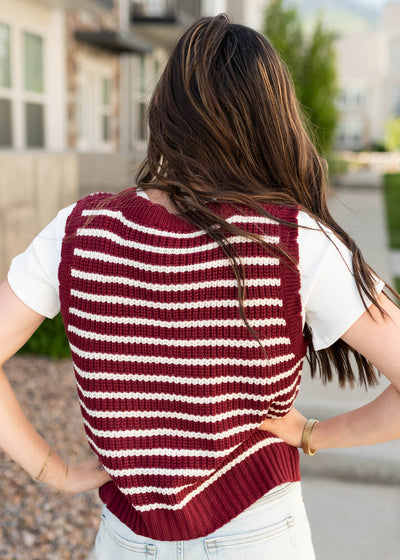 Back view of the burgundy stripe sweater vest