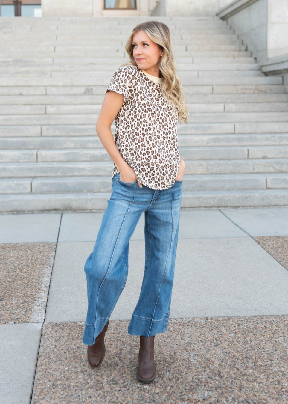 Leopard print top with short seeves and a cream neckband
