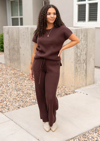 Brown ribbed bottoms with a tie at the waist