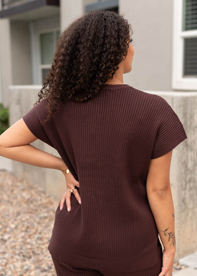 Back view of the brown ribbed sweater