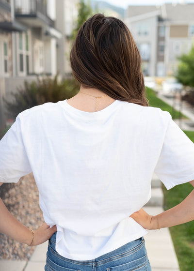 Back view of the white blue bow graphic tee