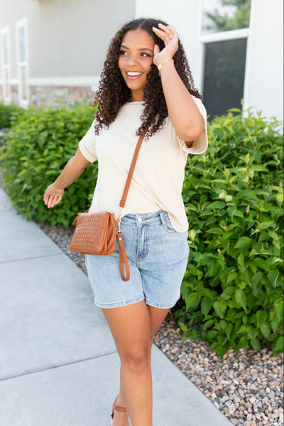 Beige top with pattern on the sleeve