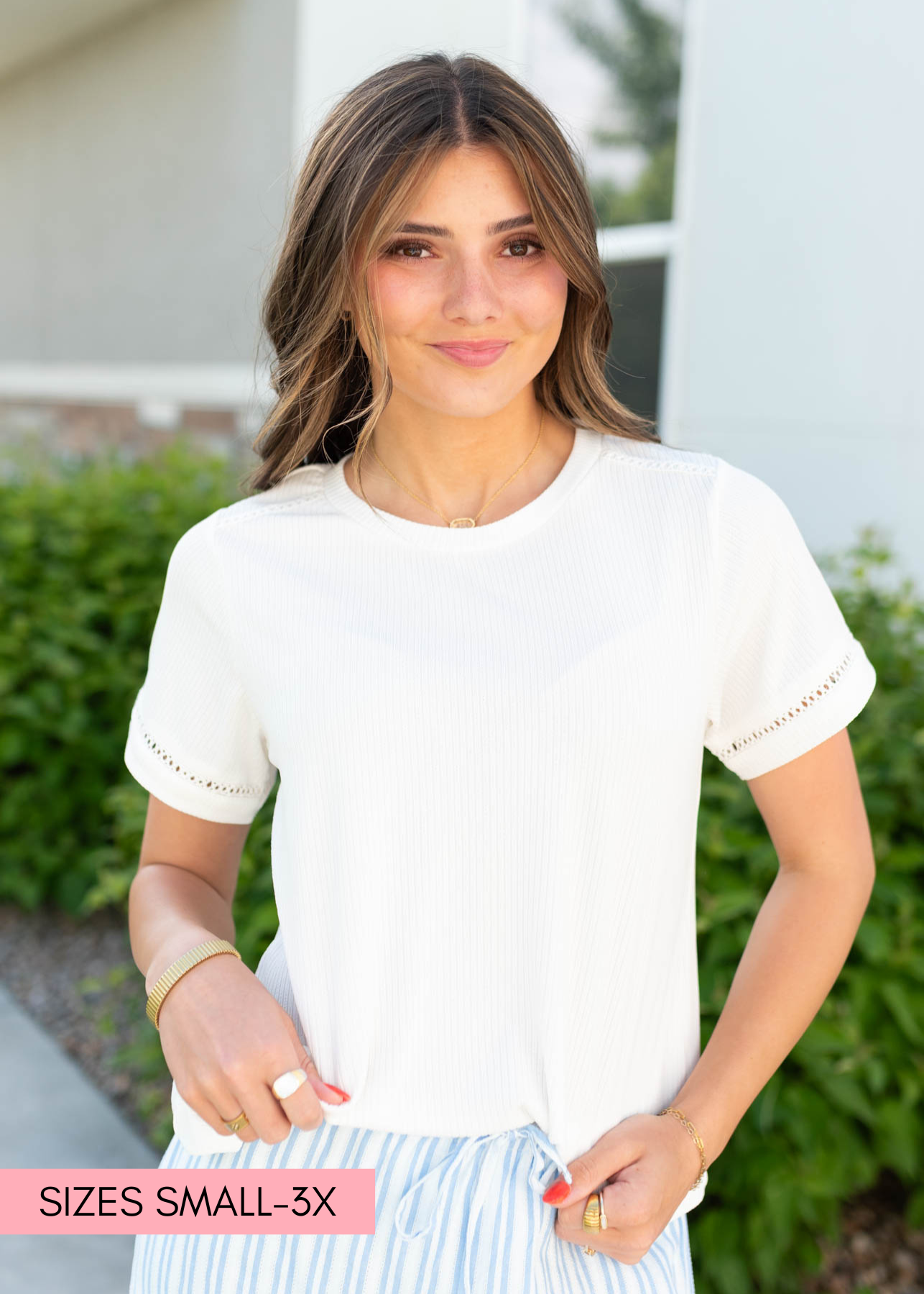 Ivory top with a crew neck