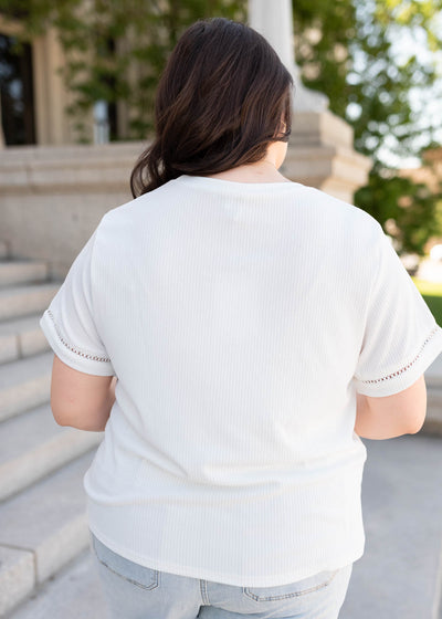 Back view of the ivory top in plus size