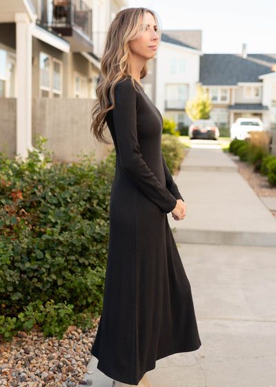 Side view of the fitted aline charcoal ribbed dress