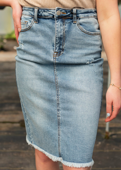 Indigo distressed skirt with frayed hem