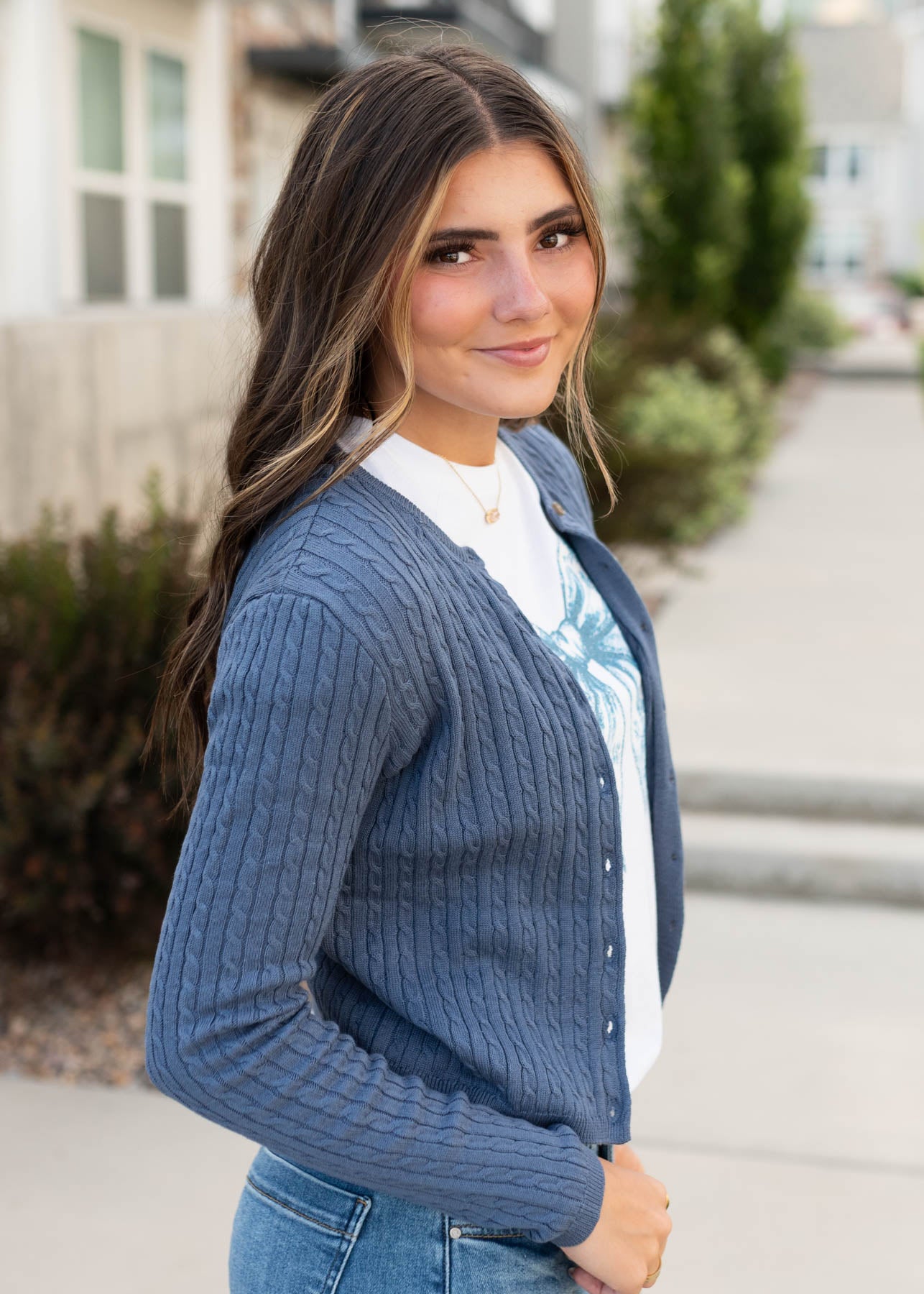 Side view of the ong sleeve dusty navy cardigan at Lena Layne