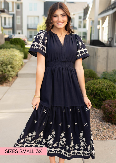 Navy embroidered dress in sizes small to 3x
