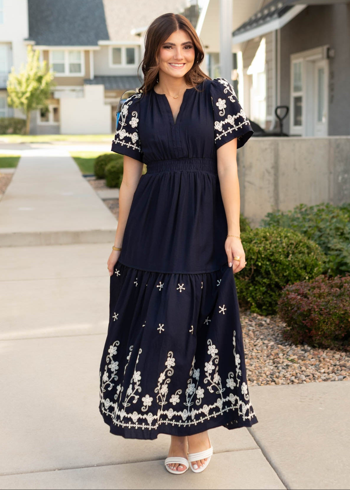 Short sleeve navy embroidered dress with elastic waist and tiered skirt
