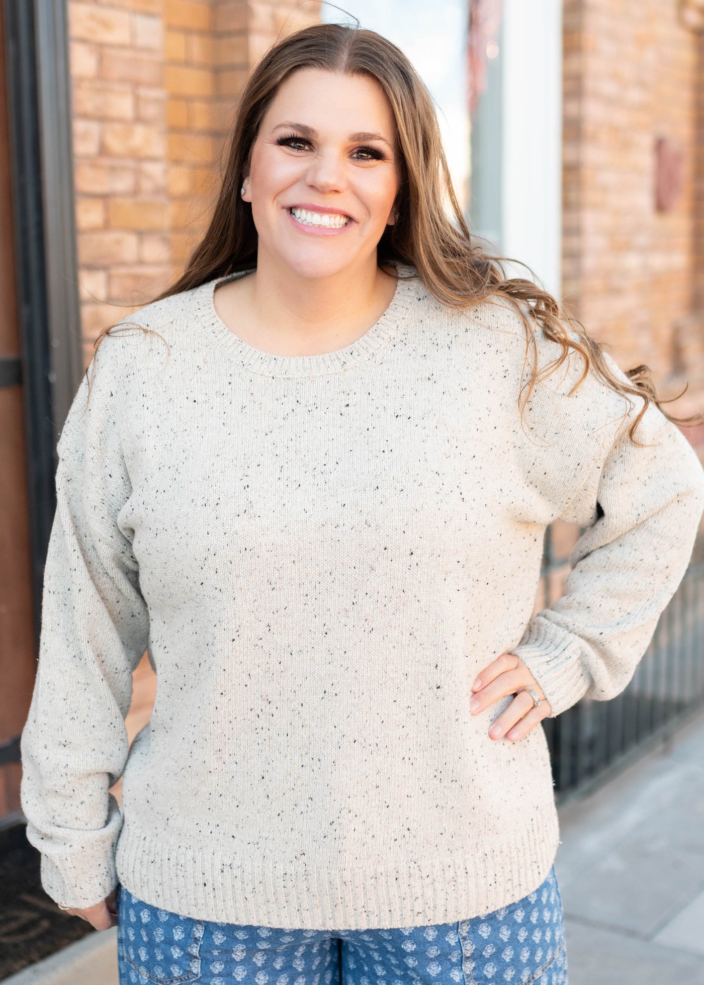 Long sleeve speckled taupe knit sweater in plus size