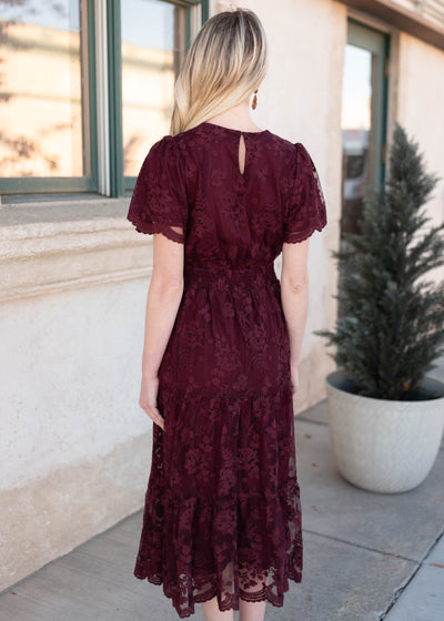 Back view of the rich wine lace dress with elastic waist