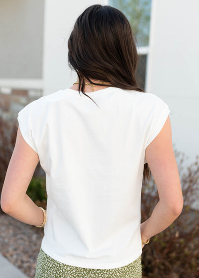 Back view of the white short sleeve top