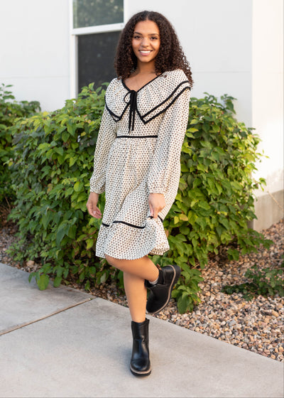 Modest cream ruffle dress with long sleeves