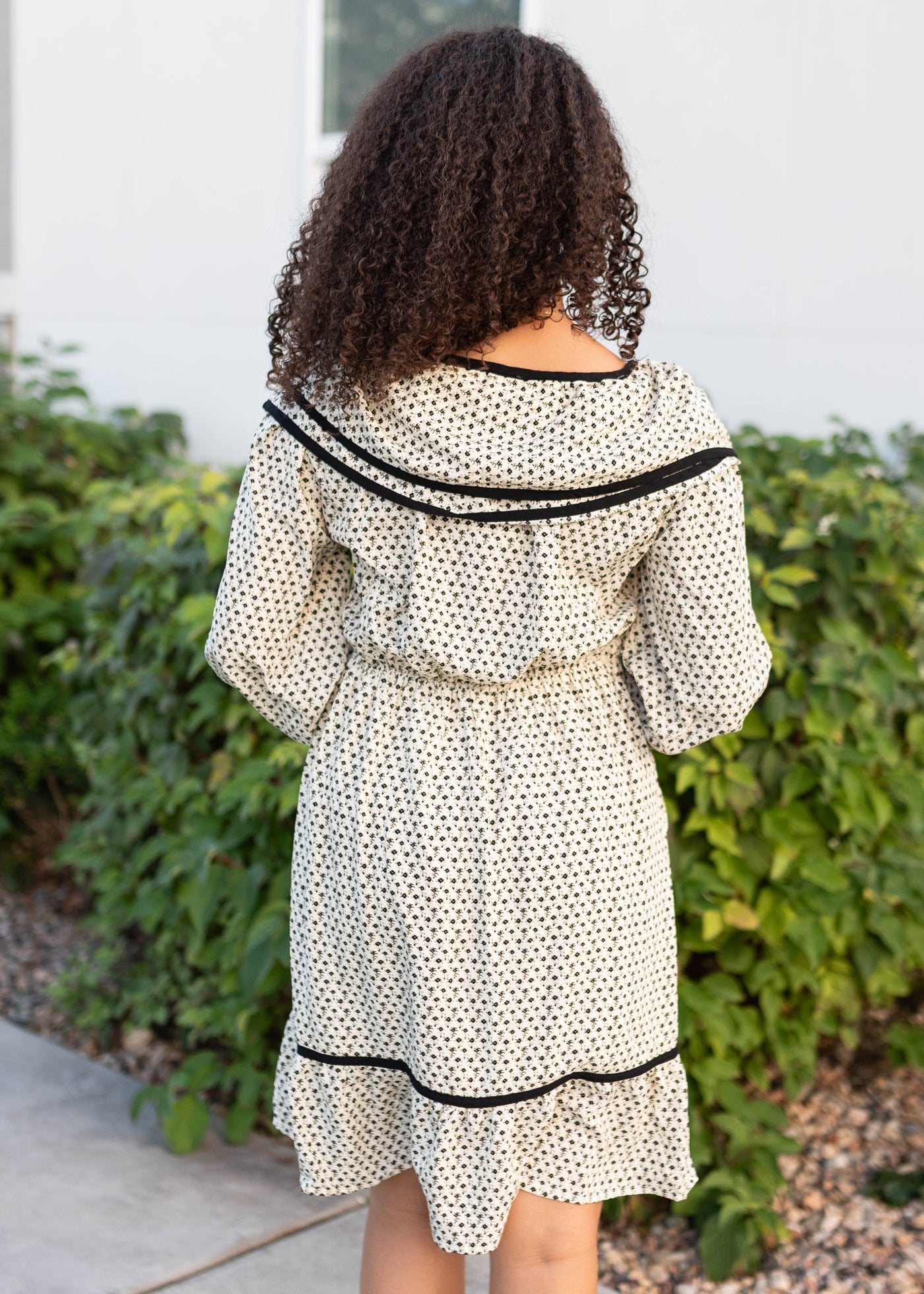Back view of the cream ruffle dress