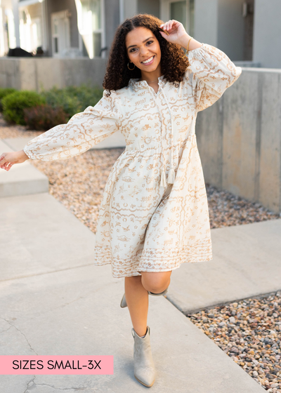 Cream patterned dress in a full range of sizes