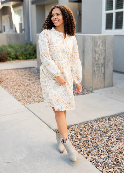 Modest cream patterned dress with long sleeves