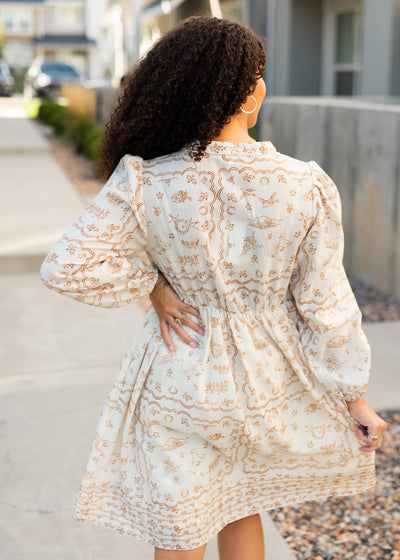 Back view of the cream patterned dress