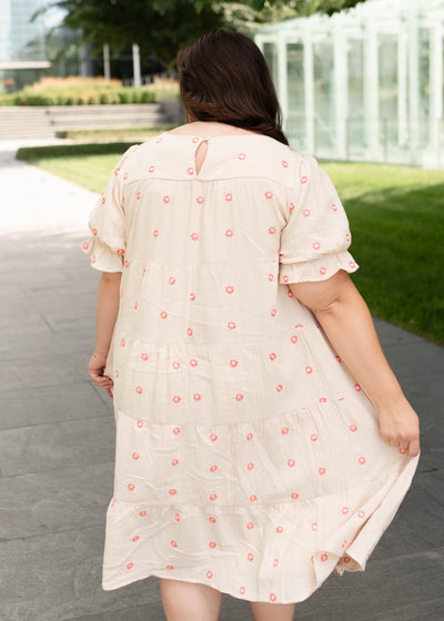 Back view of the beige floral embroidered dress  in plus size