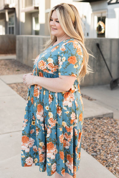 Side view of the plus size denim tiered dress