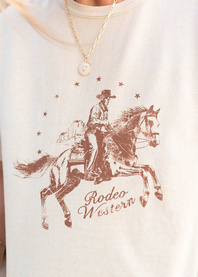 Close up of the horse on the cream rodeo top