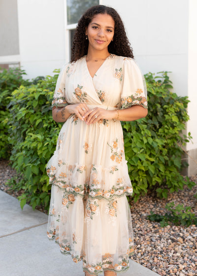 Wrap style vneck bodice on the wild flower taupe dress