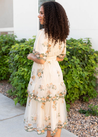 Side view of the midi wild flower taupe dress