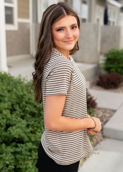 Side view of the black stripe top