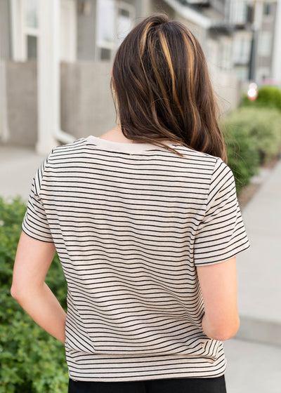 Back view of the black stirpe top