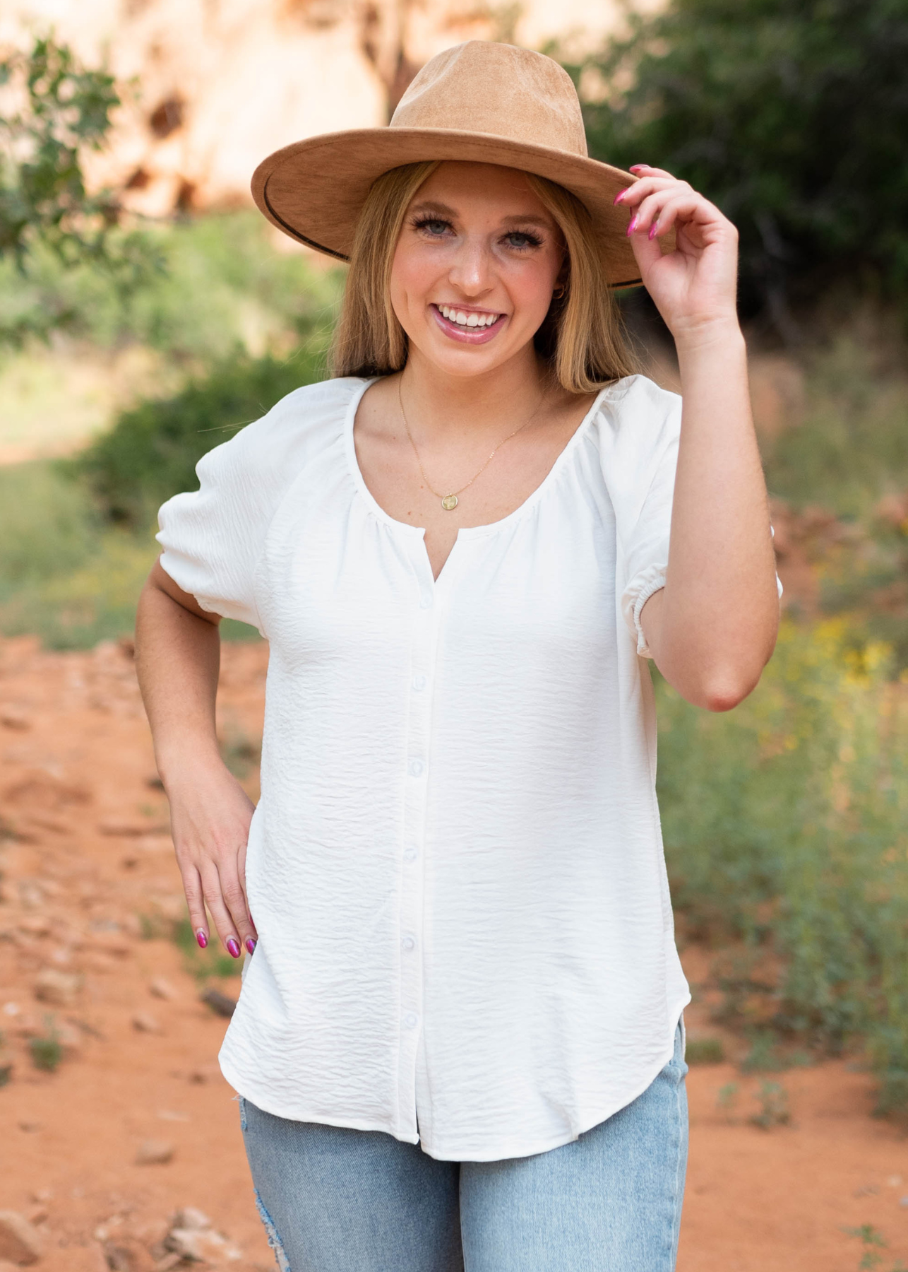 Button up white top with a scoop neck