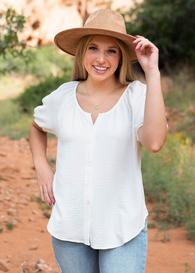Button up white top with a scoop neck