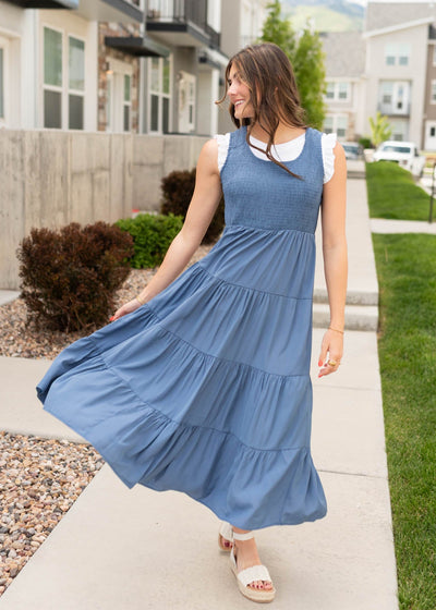 Tiered skirt on the dusty blue smocked dress