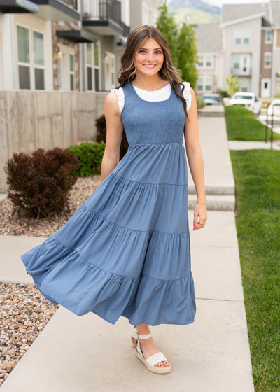 Dusty blue smocked dress without sleeves