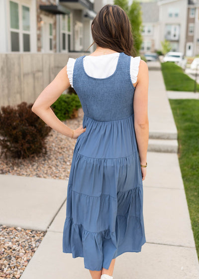 Back view of the dusty blue smocked dress