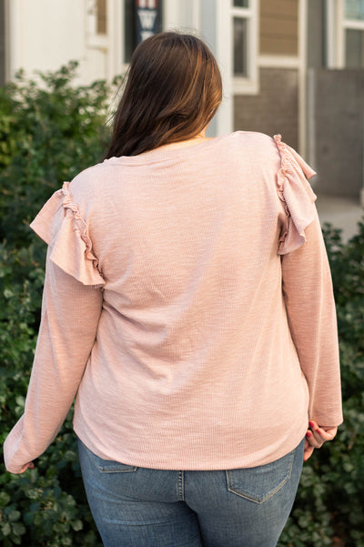 Back view of a plus size mauve top