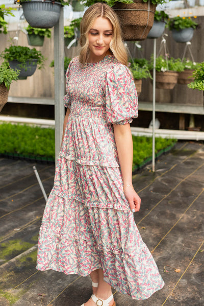Side view of the blue floral smocked dress