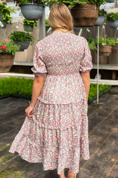 Back view of the blue floral smocked dress