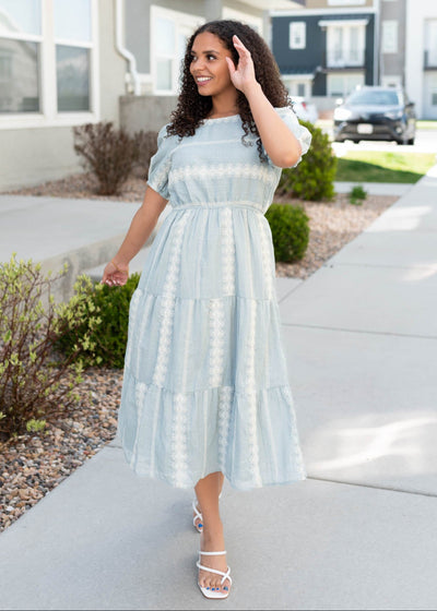 Light blue embroidered dress with tiered skirt